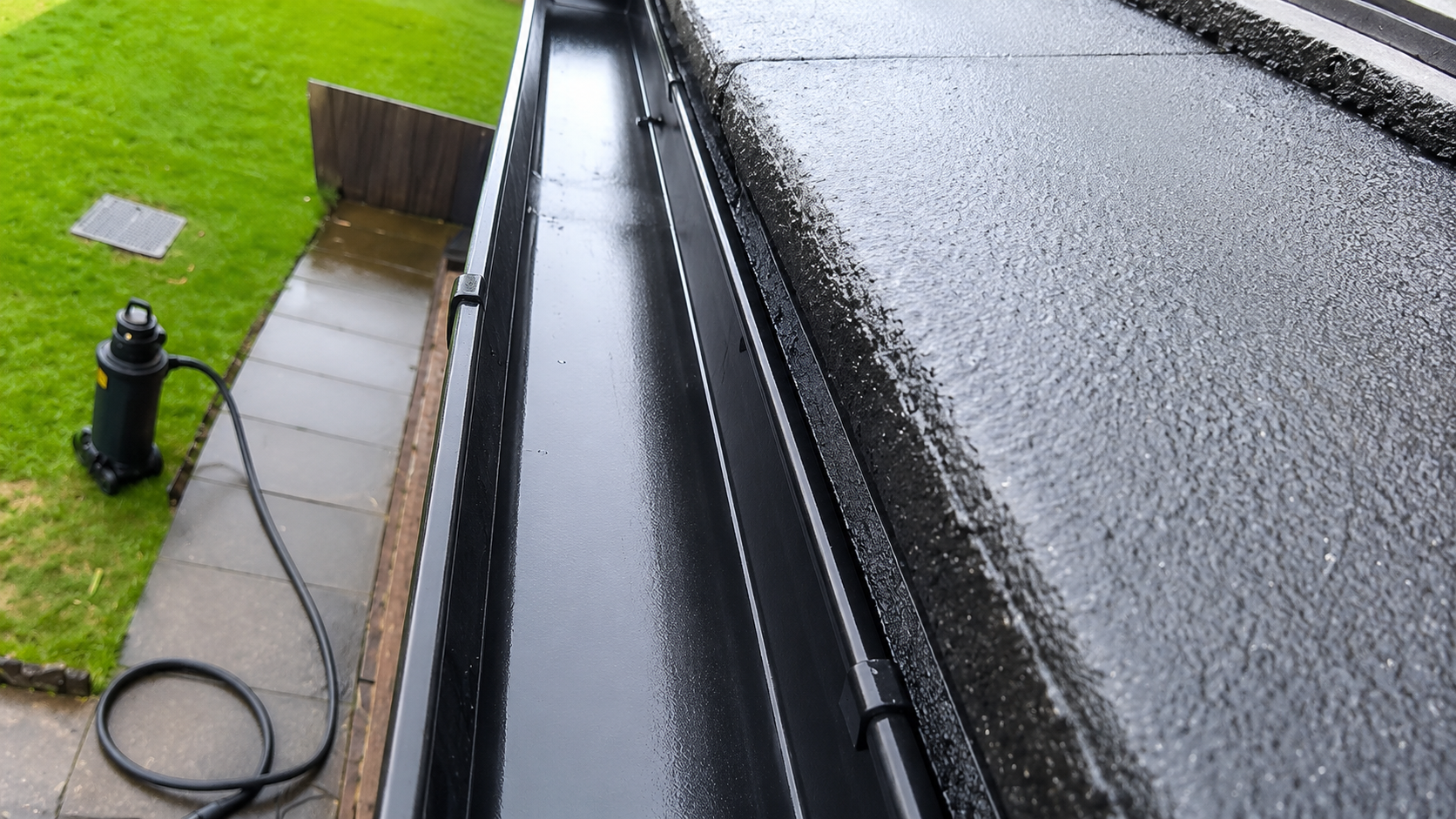 Birmingham gutter after summer health check showing clear channels and proper water flow
